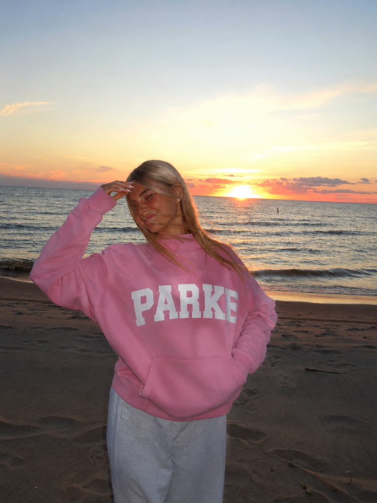 Who is Parke? Learn how a 2022 streetwear label built a loyal following with mockneck sweatshirts, varsity script, and quality that lasts.